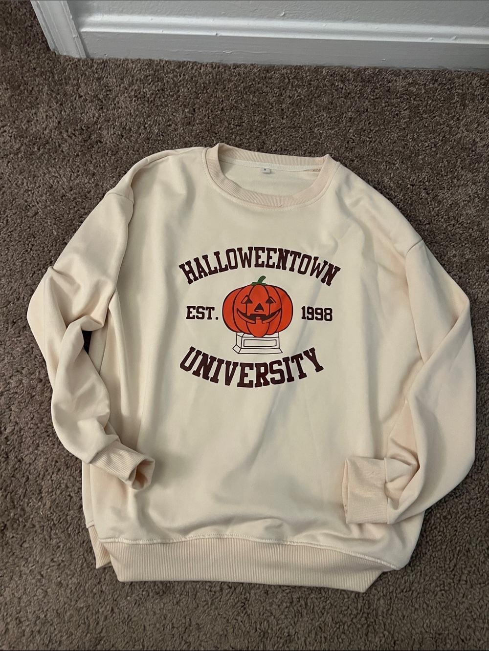 Halloweentown University Cream Sweatshirt with Pumpkin Graphic